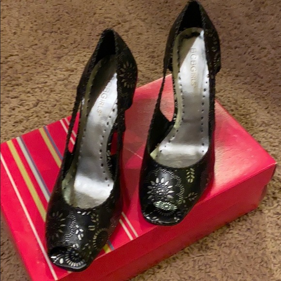 Black with silver trim BCBG peep toe heel. - Picture 3 of 7